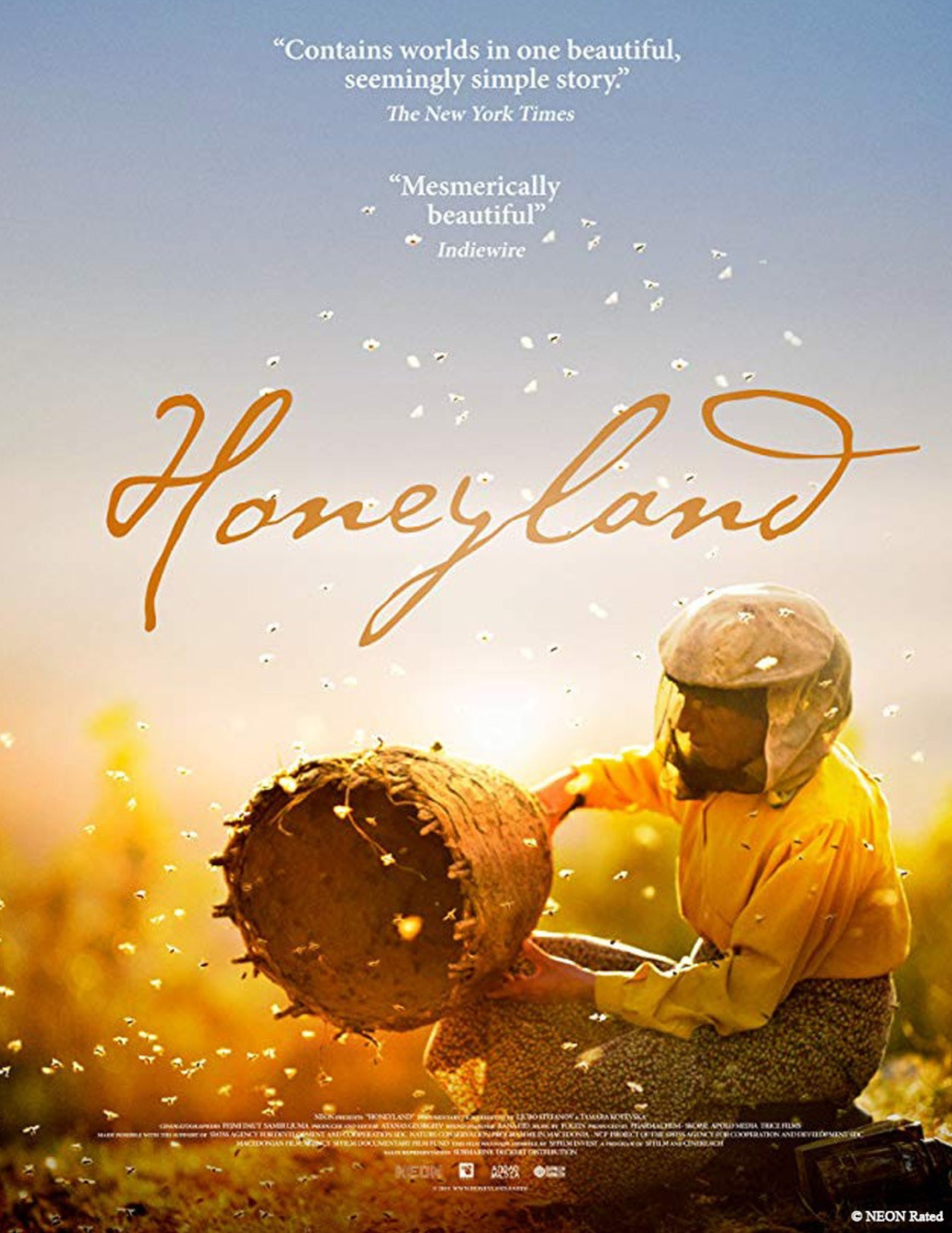 A woman with a beehive and the words Honeyland