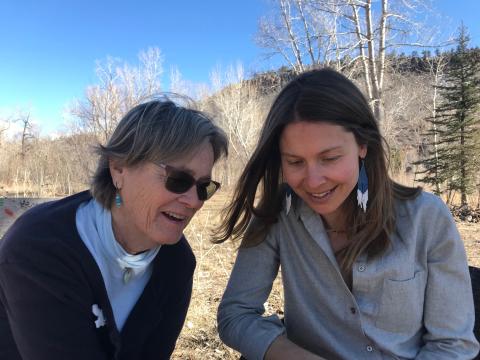 Sally King and April Tierney sharing stories. 