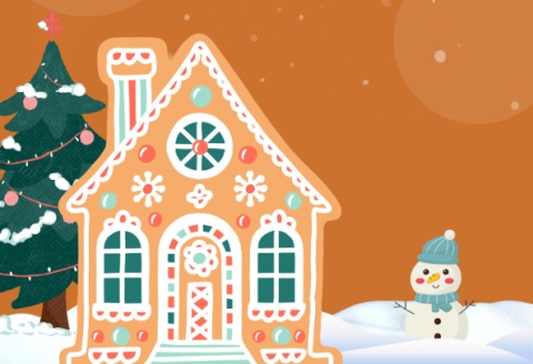 Image shows a gingerbread house with a snowman next to it.