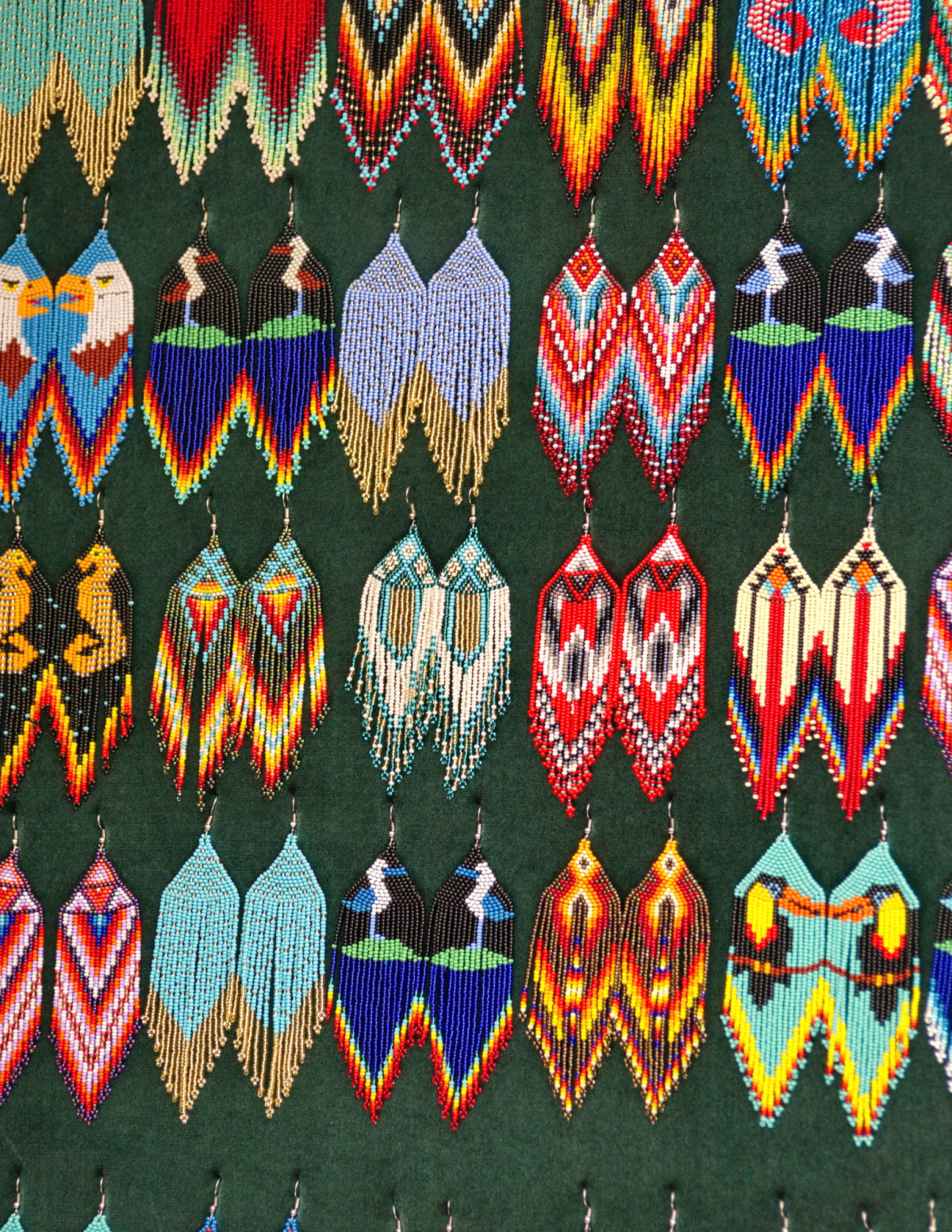 Several pairs of beaded earrings